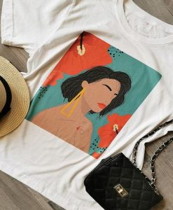 Woman with blue background and peach color flowers t shirt